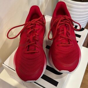 Lululemon. Like New, worn once. Blissfeel run size 7. Lunar new year, dark red.
